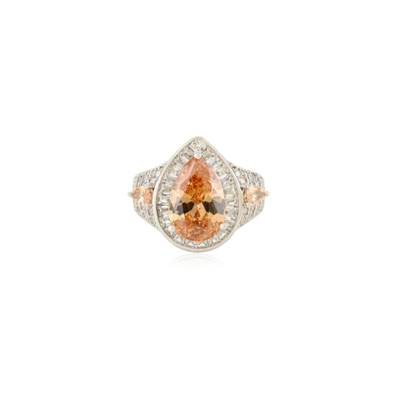 Opulent Silver Ring with Bold Pear Citrine and CZ Baguettes