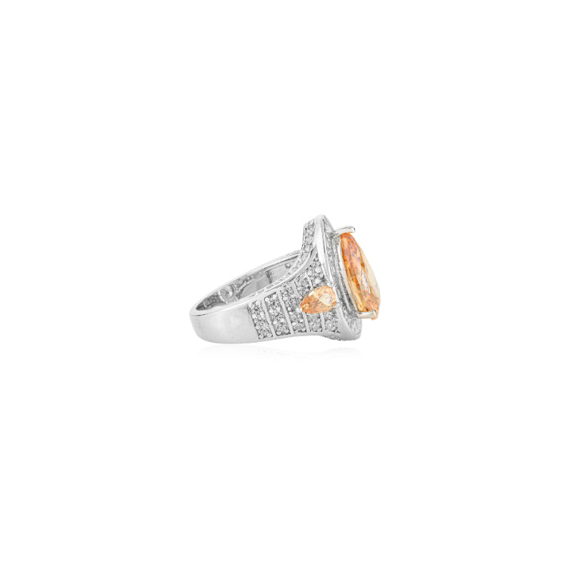 Opulent Silver Ring with Bold Pear Citrine and CZ Baguettes
