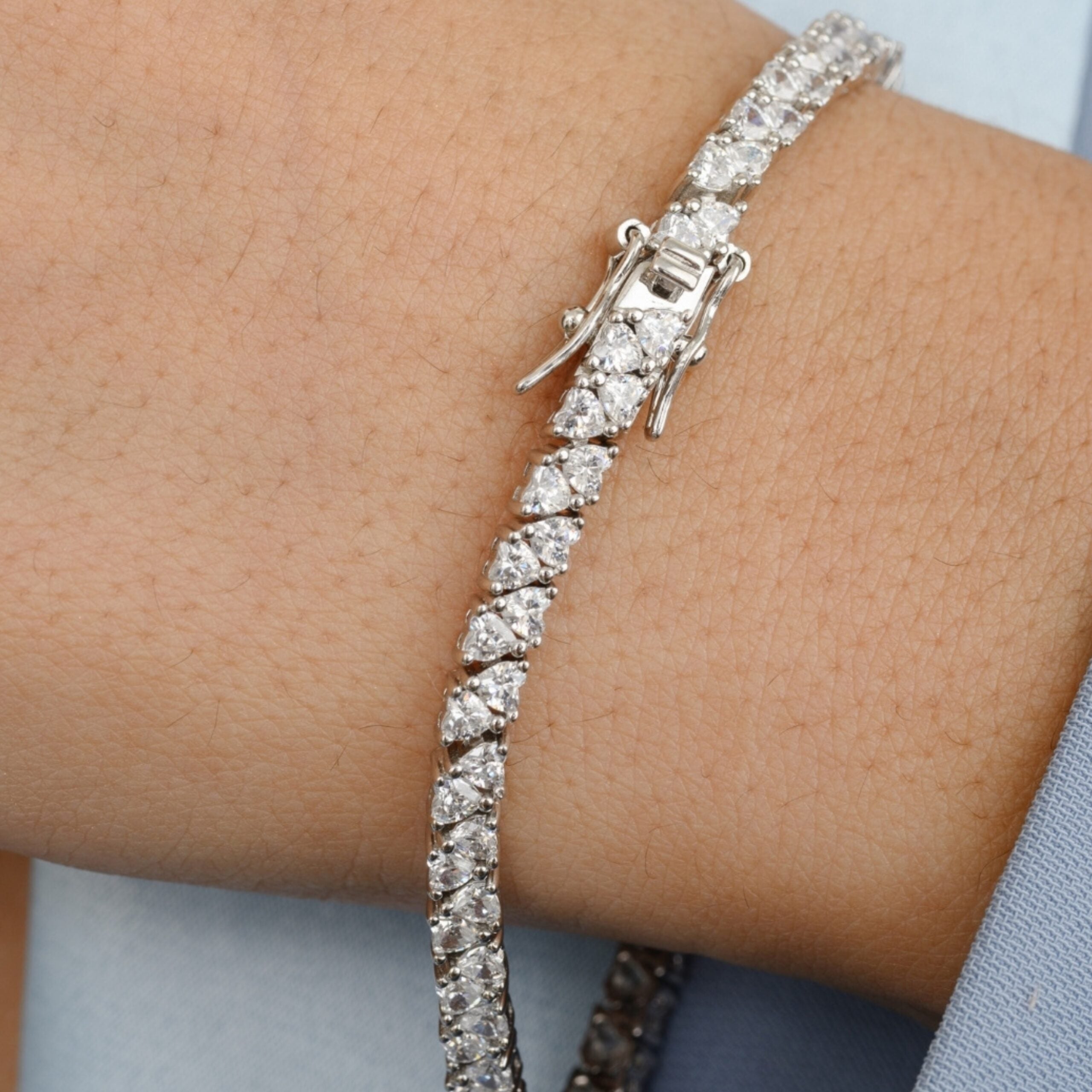 Criss cross heart tennis bracelet