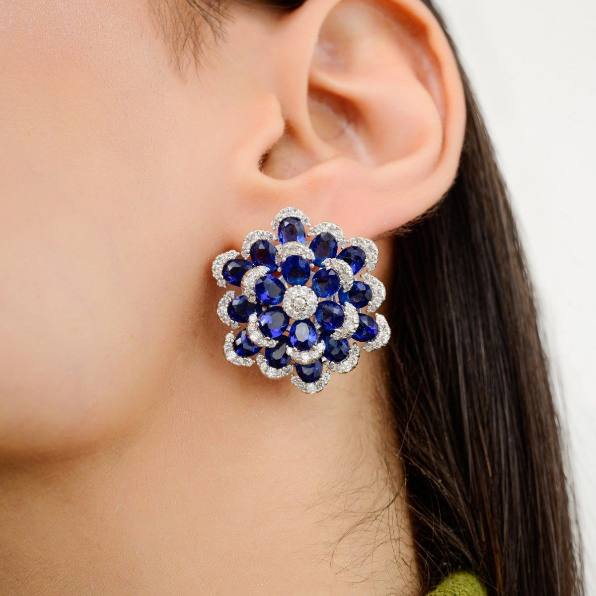 925 Silver Floral Stud Earrings with Sparkling Blue CZ Diamonds